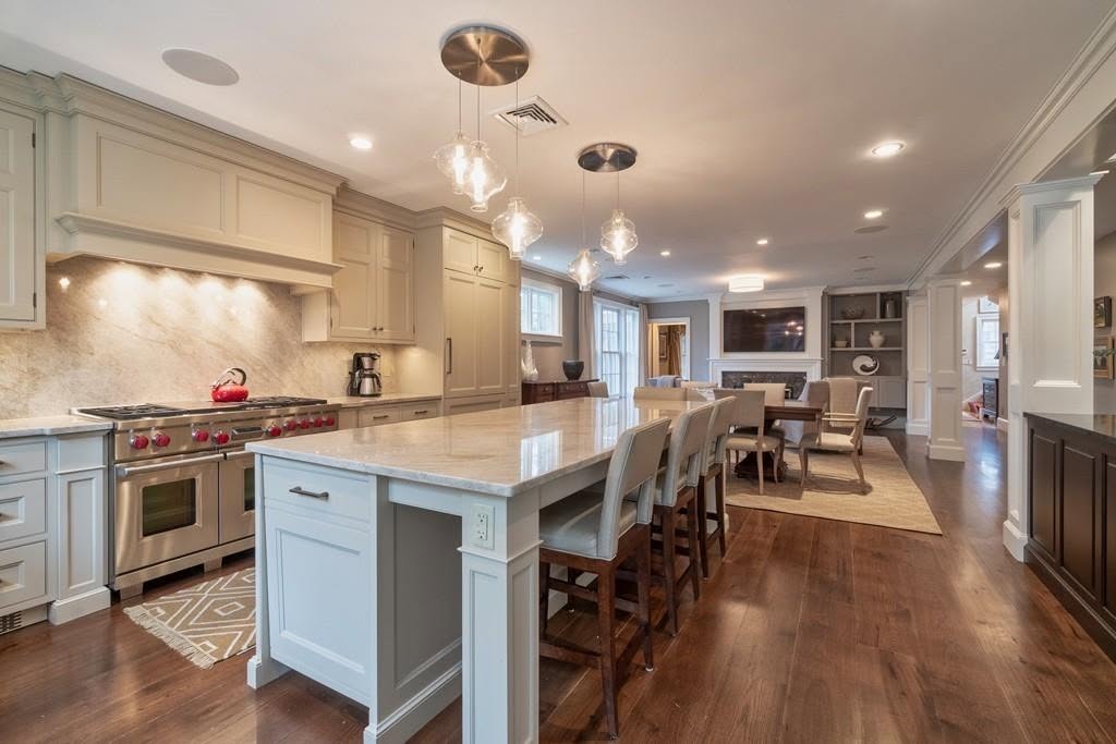 C&K Contracting’s finished kitchen with custom cabinetry and a generous island